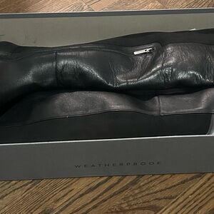 Black Aquatalia over the knee boots